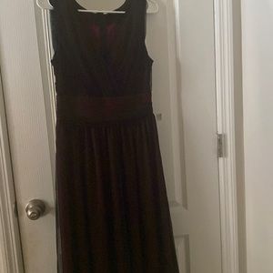 Maroon prom dress with black lace/mesh on top. Mid length. Never worn